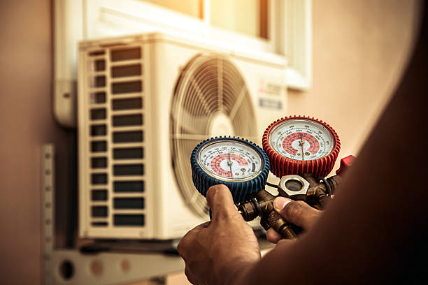 Professional Ac Installation technician working in West Jefferson, OH